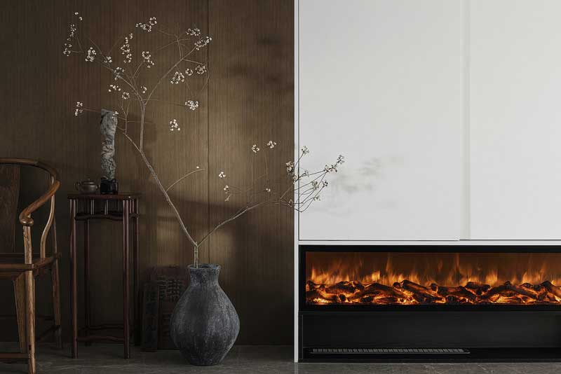 現代壁爐的應用為空間帶來了一抹亮色，活潑跳躍的火苗，讓人在平靜中涌起濃濃暖意。