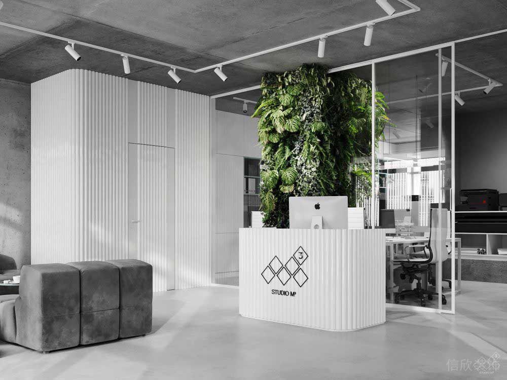 前臺接待區(qū)布藝沙發(fā)玻璃隔斷背景裝修設計圖