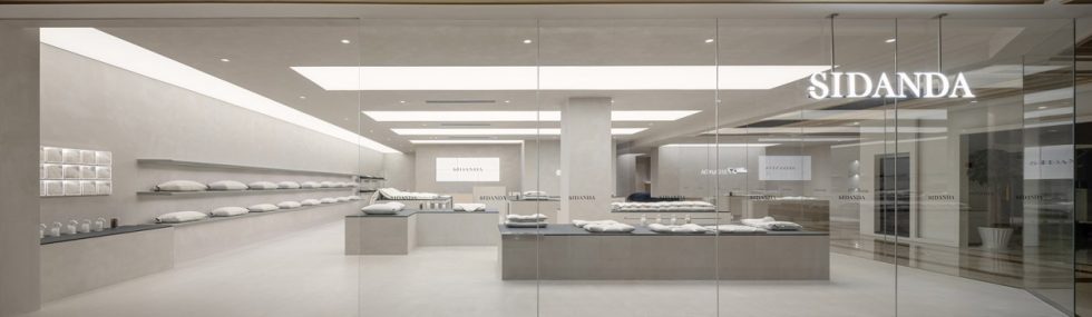 深圳市龍崗區(qū)中心城現(xiàn)代風(fēng)科技枕專賣店裝修門廳