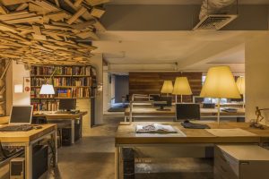 深圳龍崗凱騰大廈500平方米暖色調工業風辦公室裝修案例辦公區效果圖