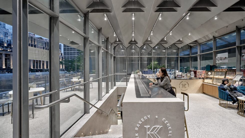 深圳市南山區南油中石化加油站實景效果圖-室內灰色水泥吧臺休息區 深圳市南山區南油中石化加油站實景效果圖-室內灰色水泥吧臺休息區