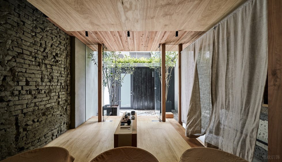 工業(yè)風茶室原木地臺品茗區(qū)裝修設(shè)計